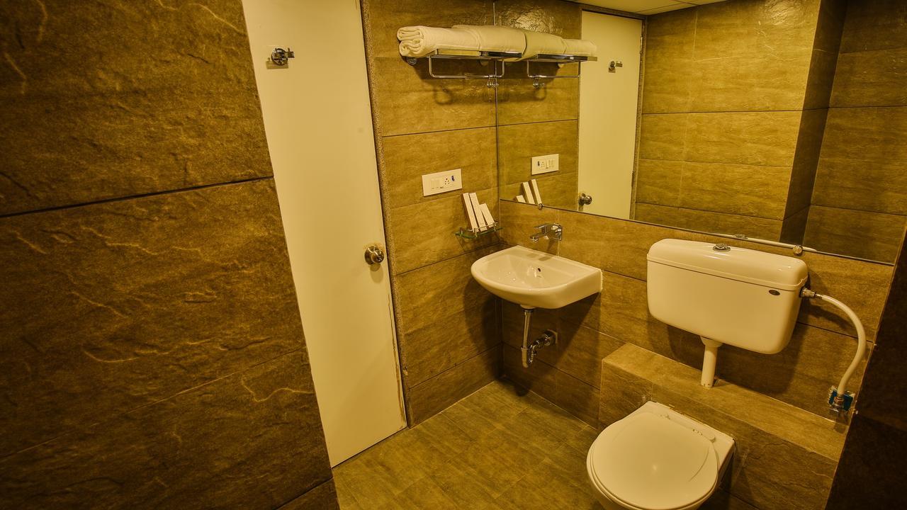 The Weekend Address Hotel Сурат Екстериор снимка