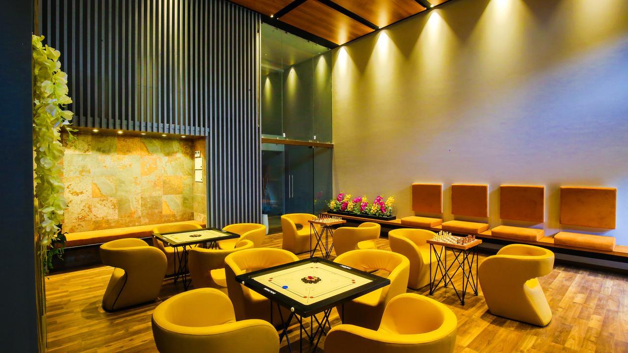 The Weekend Address Hotel Сурат Екстериор снимка